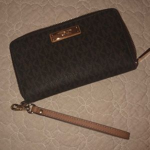 Authentic Michael Kors zipper wallet/phone case